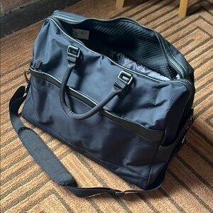 Open Story Black Travel Bag